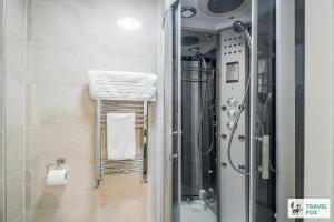 a bathroom with a shower and a sink at Louisa's Stay in Luton +25 photos