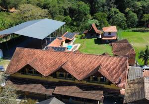 an overhead view of a house with a roof at Pousada Guimaraes in São Pedro da Serra