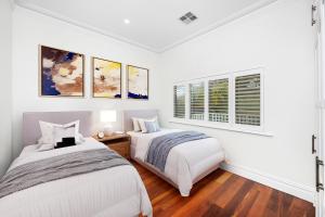 Postel nebo postele na pokoji v ubytování Stylish Suburban Getaway Spacious&bbq