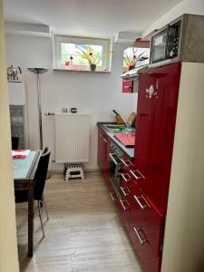 Kuchyň nebo kuchyňský kout v ubytování Schicke Einliegerwohnung