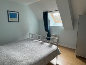 a small bedroom with a bed and a window at Domaine Saint Jean in Saint-Côme-du-Mont +16 photos