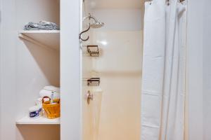 a bathroom with a shower and a white shower curtain at Waterbury Studio 12 Mi to Bolton Valley Ski Resort in Waterbury +16 photos