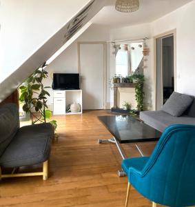 Μια τηλεόραση ή/και κέντρο ψυχαγωγίας στο Appartement Paris 16e Passy Tour Eiffel