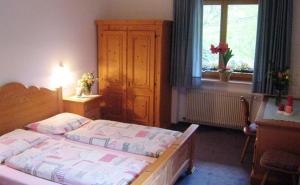 Ένα ή περισσότερα κρεβάτια σε δωμάτιο στο Hotel Mair Am Bach