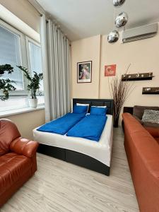 Ένα ή περισσότερα κρεβάτια σε δωμάτιο στο Princess main square apartment +21 φωτογραφίες