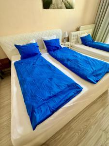 Ένα ή περισσότερα κρεβάτια σε δωμάτιο στο Princess main square apartment