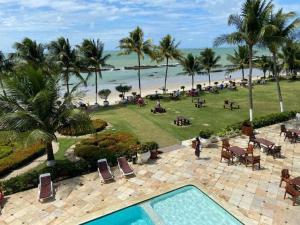a view of the beach from the resort at Apart Hotel Marinas Tamandaré - apt 304 in Tamandaré