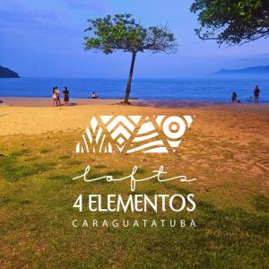 Un cartel en una playa con un árbol y el océano. en Lofts 4 Elementos - Fogo - Martim de Sá - Caraguatatuba, en Caraguatatuba 13 fotos más