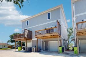 a house with two balconies on the side of it at Beaufort Villas #B in Beaufort