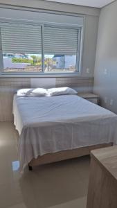 Katil atau katil-katil dalam bilik di Apartamento Duplex +28 gambar