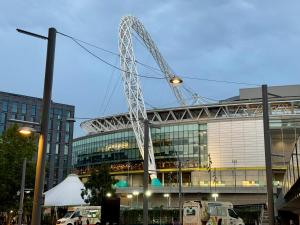 a large crane on the side of a building at Luxury Wembley Apt - 9 guests! in London +22 photos