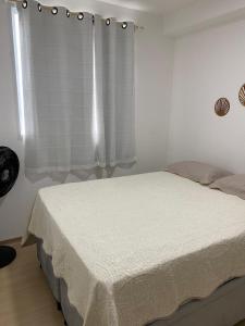 Postel nebo postele na pokoji v ubytování Apartamento aconchegante + 10 fotografií