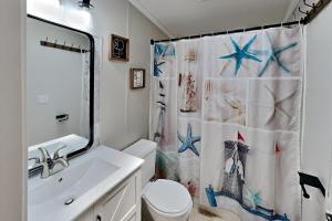 Koupelna v ubytování Island Club #106 + 23 fotografií