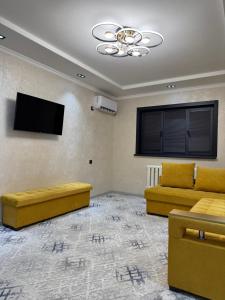 TV a/nebo společenská místnost v ubytování Квартира посуточно