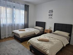 Ένα ή περισσότερα κρεβάτια σε δωμάτιο στο Apartment SIANA