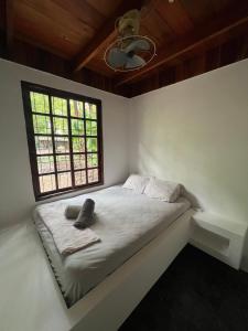 Postel nebo postele na pokoji v ubytování Woodstock Hostel