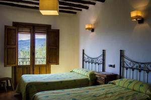 Ένα ή περισσότερα κρεβάτια σε δωμάτιο στο Casa Nº9