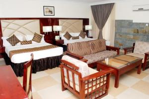 Ένα ή περισσότερα κρεβάτια σε δωμάτιο στο De Rembrandt Hotels and Suites
