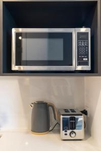 Η κουζίνα ή μικρή κουζίνα στο Comfy Studio 1BR South Brisbane Sauna & Spa, Walk to South Bank BO12304-2