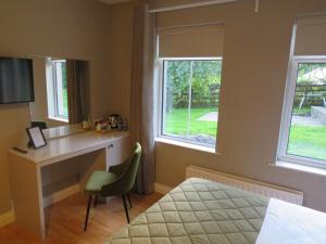 TV/trung tâm giải trí tại Maine House Galgorm