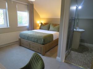 Ένα ή περισσότερα κρεβάτια σε δωμάτιο στο Maine House Galgorm