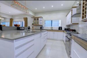 Køkken eller tekøkken på Pinnacle Golf Estate Haven + 56 billeder