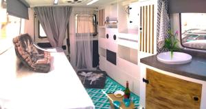 Ένα ή περισσότερα κρεβάτια σε δωμάτιο στο Alquila Camper Van EXPLORA TENERIFE