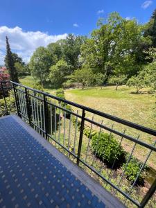 a balcony with a view of a field at Villa Ortensia in Valle San Nicolao