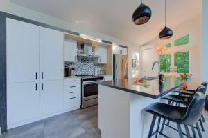 Kuchyň nebo kuchyňský kout v ubytování Chalet Equinoxe + 26 fotografií