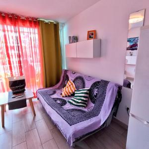 En eller flere senge i et værelse på BuEnA ViBrA Tenerife Sur