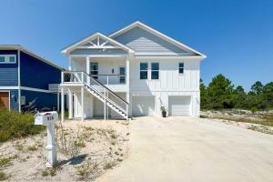 a house on the beach with a driveway at The Avery House in Pensacola
