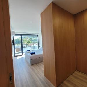 En eller flere senge i et værelse på Casa da Praia - Gerês