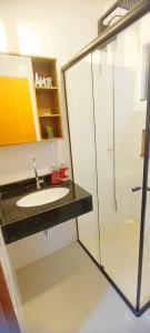 Koupelna v ubytování Jk Beach House Praia de Leste- Piscina e Ar condicionado