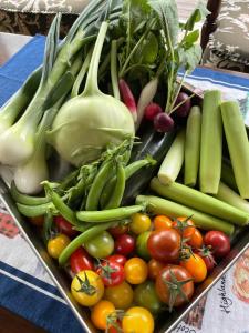 a tray of vegetables sitting on a table at 森のうた Morinouta Forest Stay in Nikko in Nikko