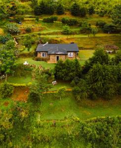 an aerial view of a house in a field at 4154ft Ramboda in Ramboda