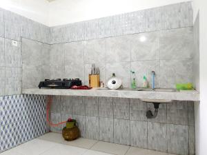 Køkken eller tekøkken på Gana Bali Guest House