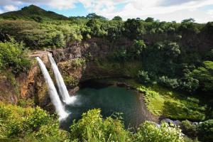 a view of a waterfall in the middle of a river at PalmTop Paradise in Anahola