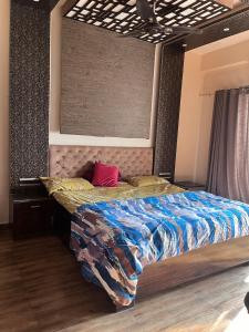 Ένα ή περισσότερα κρεβάτια σε δωμάτιο στο 3bhk Flat Near by nature