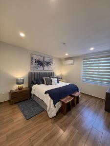 a bedroom with a large bed and a window at Casa al Mare in Mazatlán +76 photos
