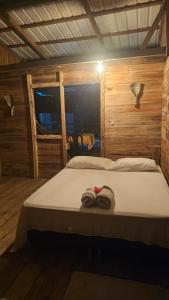 Ένα ή περισσότερα κρεβάτια σε δωμάτιο στο Tegewa Lodge +36 φωτογραφίες