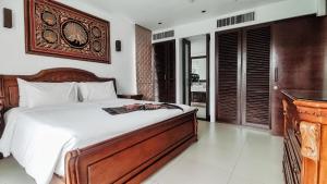 Ένα ή περισσότερα κρεβάτια σε δωμάτιο στο Casuarina Shores Apartment - SHA Plus +46 φωτογραφίες