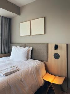 Ένα ή περισσότερα κρεβάτια σε δωμάτιο στο Richmond Hotel Asakusa +37 φωτογραφίες