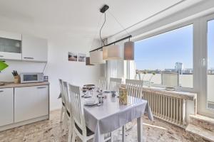 Kuchyň nebo kuchyňský kout v ubytování Rotesand - 128