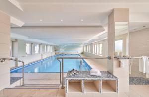 a large swimming pool in a hotel room at Nautic - 812 in Cuxhaven