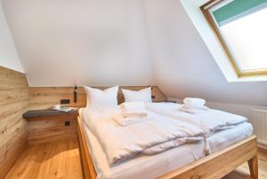Ένα ή περισσότερα κρεβάτια σε δωμάτιο στο Haus Oasis - 18