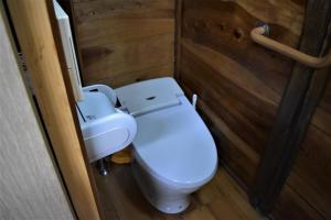 a small bathroom with a toilet and a sink at Guest House Miei - Vacation STAY 87547v in Nagahama +11 photos