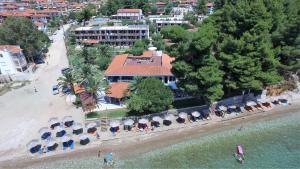 an aerial view of a resort on the beach at Porto Matina in Metamorfosi