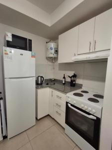 Køkken eller tekøkken på Excellent Monoambiente