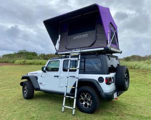 a white jeep with a camper on top of it at Island Breeze Rooftop Camper fully equipped rubicon in Anahola