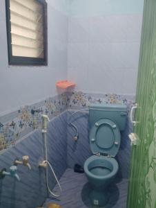 Ένα μπάνιο στο Bhavadesh Lodge